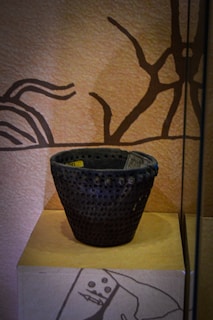 Close-up of a textured gray centerpiece blending art and functionality