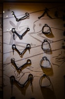 Handcrafted iron ore tools lined up, highlighting their sturdy craftsmanship.