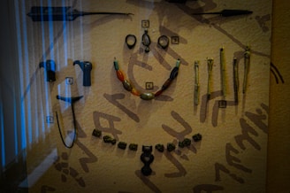 Museum display featuring authentic medieval jewelry with explanatory labels.