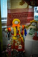 A vibrant display of children's dolls in various styles.