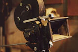 A close-up of a vintage film camera used in one of Cinevivre's productions.