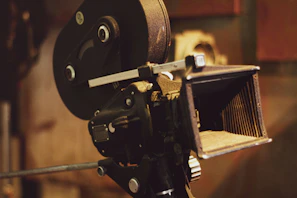 A close-up of a vintage film camera used in one of Cinevivre's productions.