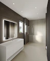 Bright and spotless bathroom with shining tiles and mirrors.