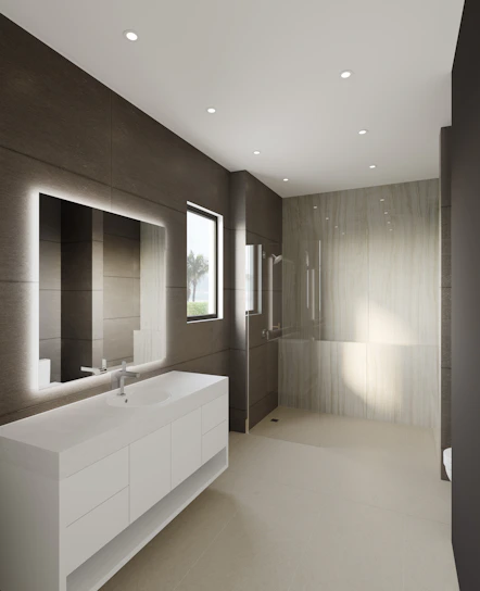 A bright, modern bathroom featuring sleek storage solutions from Angel Pro Home blending seamlessly with contemporary decor.