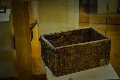 Close-up of a finely laser-engraved wooden keepsake box with intricate patterns.