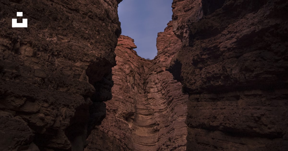 A narrow path between two large rocks photo – Free Argentina Image on ...