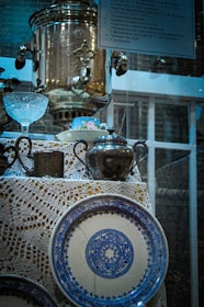 Elegant kitchenware pieces arranged aesthetically from Samra Arman's collection.