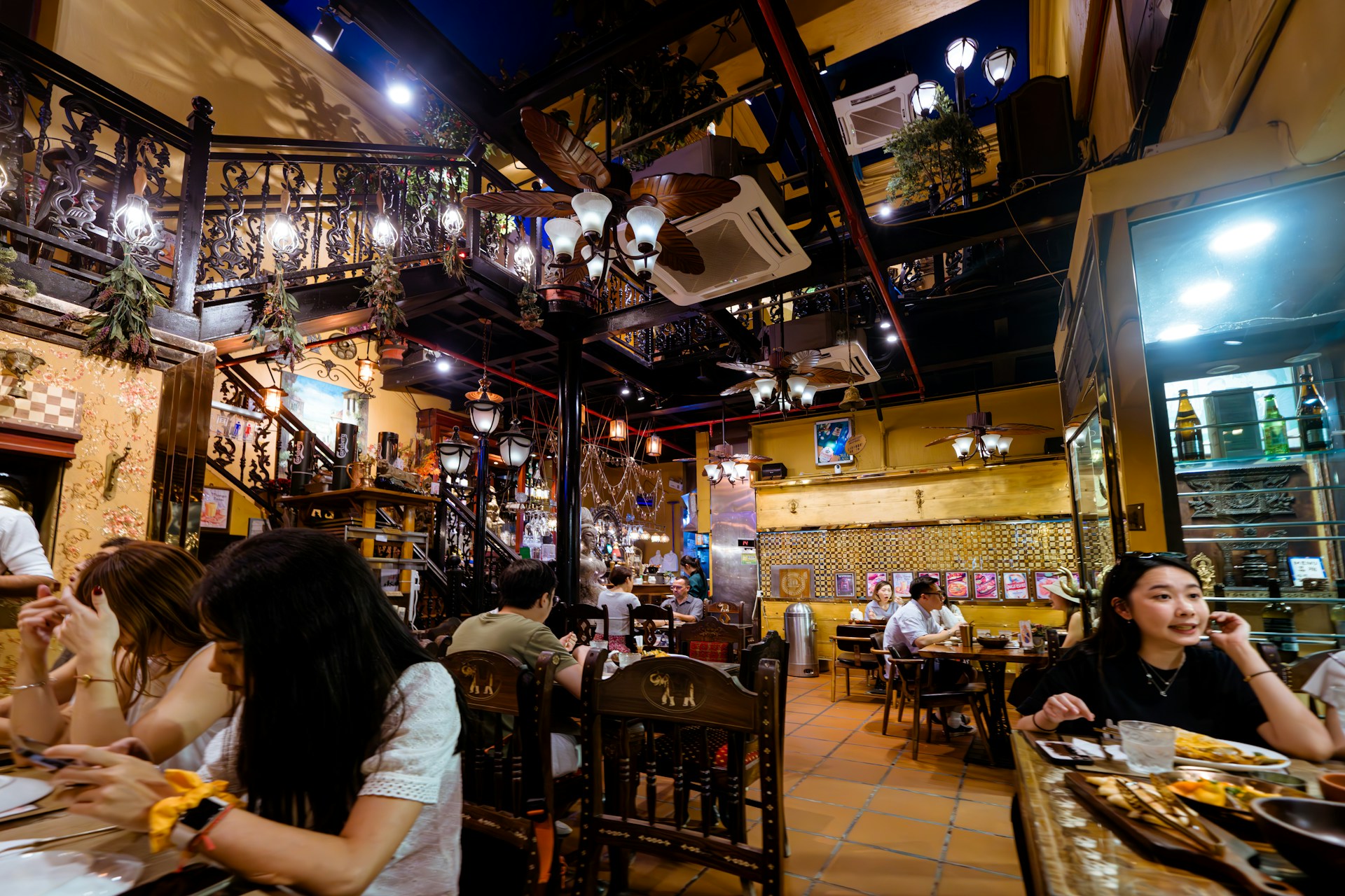 woman wearing yellow long-sleeved dress under white clouds and blue sky during daytime