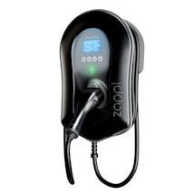 A sleek, black electric vehicle charging station with a built-in digital screen displaying various icons and indicators. It has a plug attached to a charging cable, which is coiled neatly at the bottom.