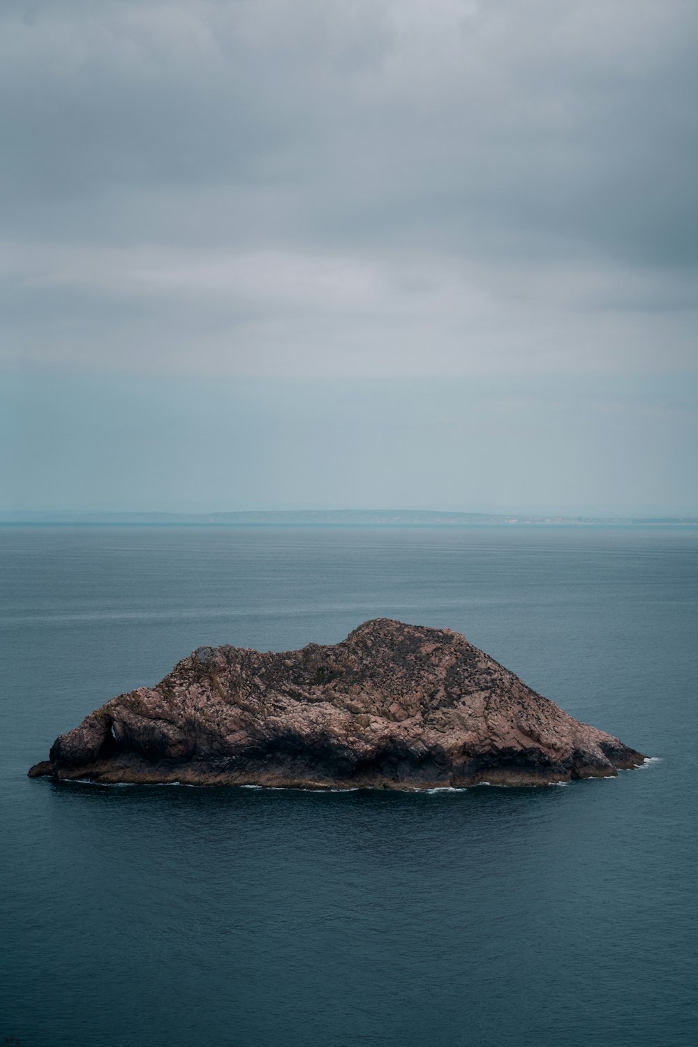 a small island in the middle of the ocean