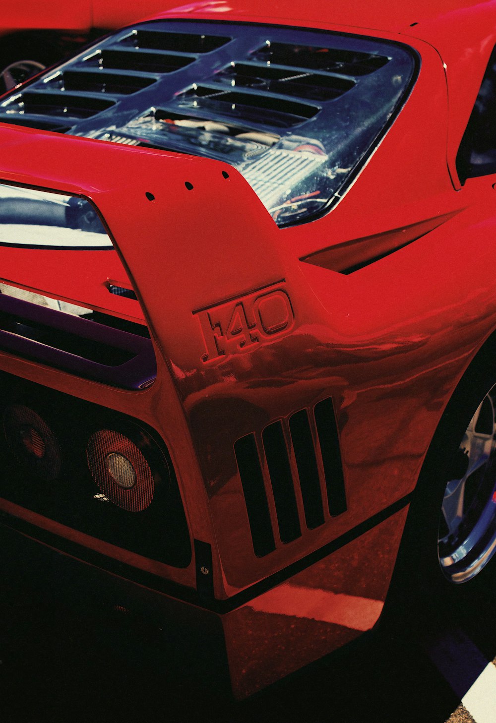 a close up of a red sports car