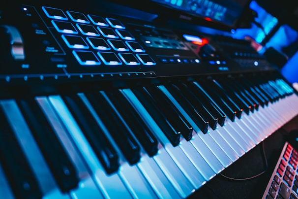 Close-up of futuristic music technology with glowing interfaces.