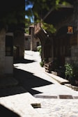 An old village street showcasing historic architecture and cobblestone paths