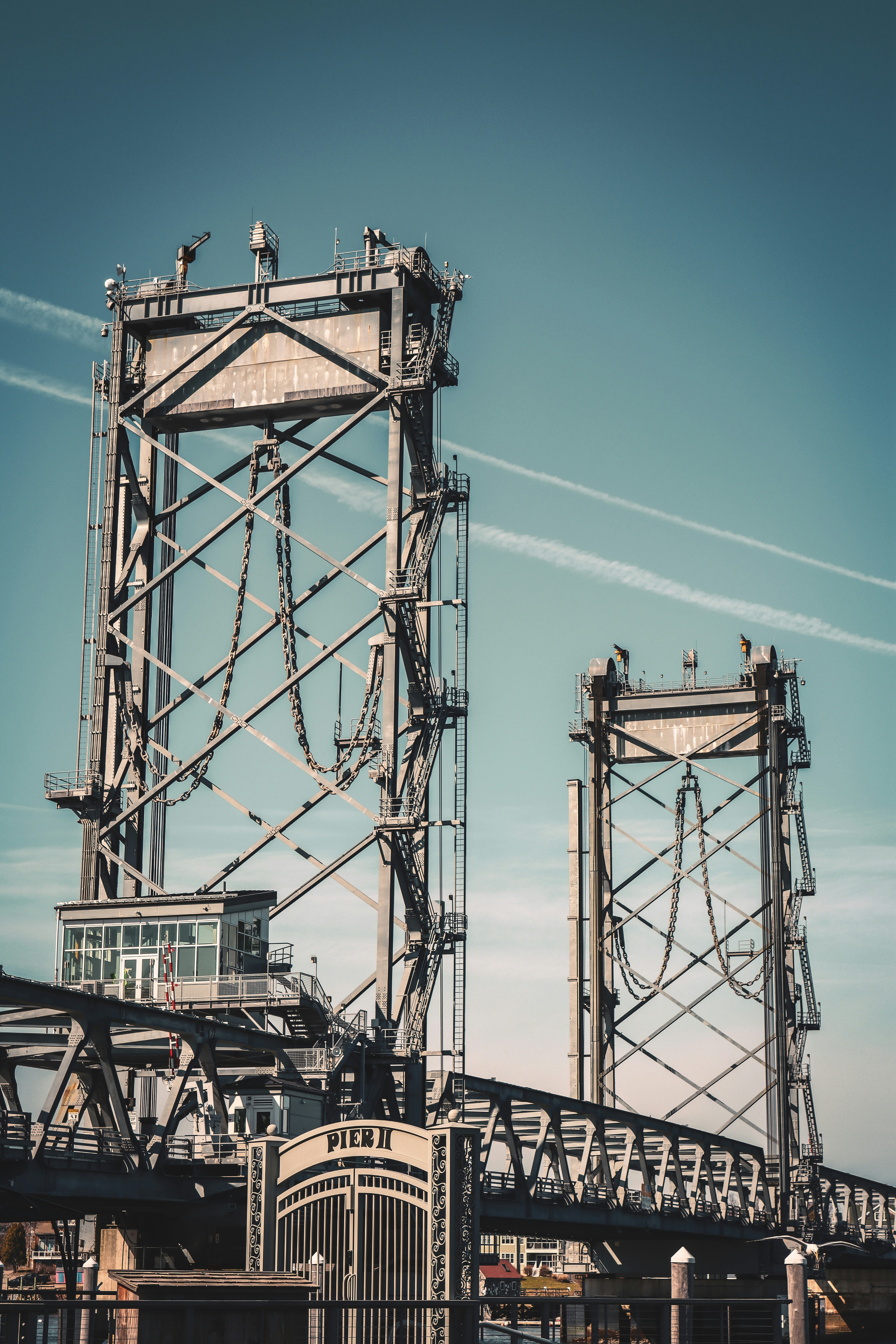 a large metal structure sitting on top of a bridge