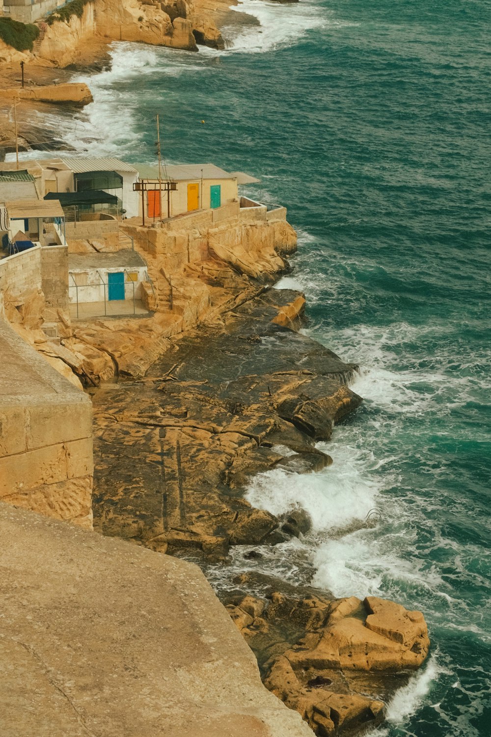 a view of the ocean from a cliff