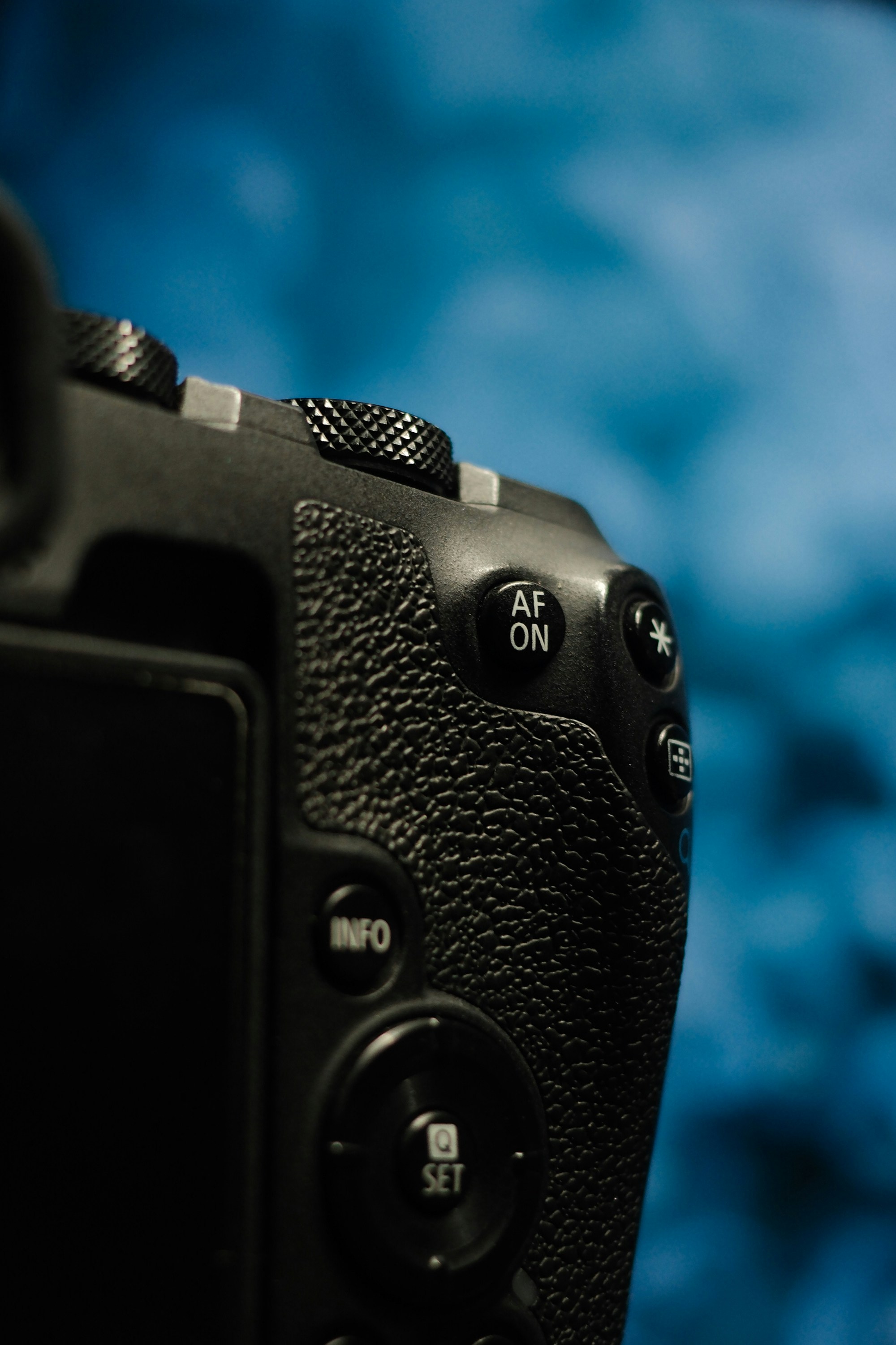 a close up of a camera with a blurry background