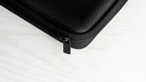 Close-up of a durable case with reinforced edges and smooth zipper.