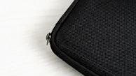 Close-up of durable zippers and fabric texture on a voyanta travel organizer.