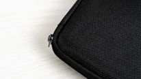 Close-up of premium waterproof fabric texture on the travel organizer.