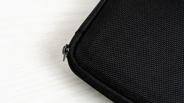 Close-up of the premium waterproof fabric and zipper seal of the travel organizer.