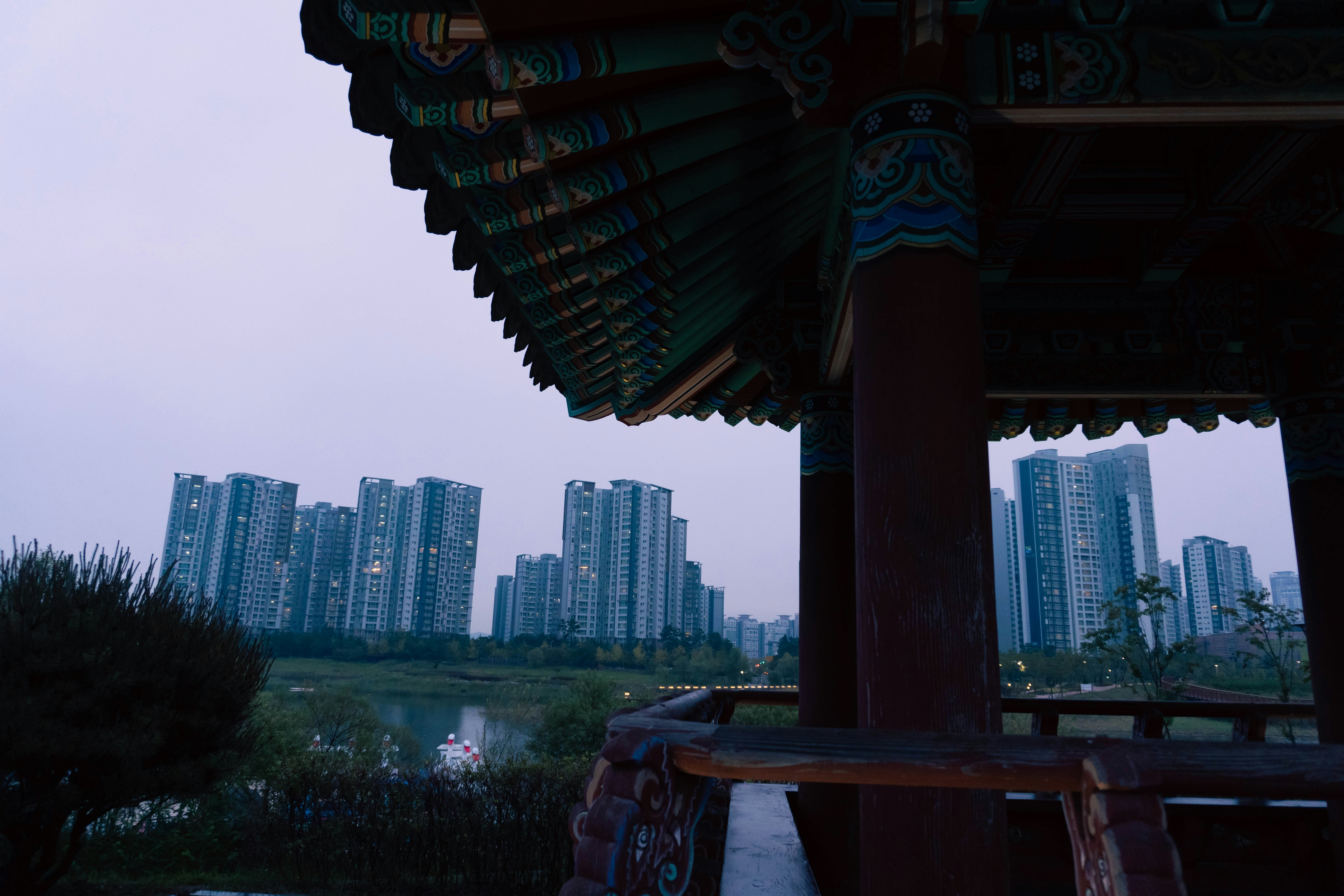 a view of a city with tall buildings in the background