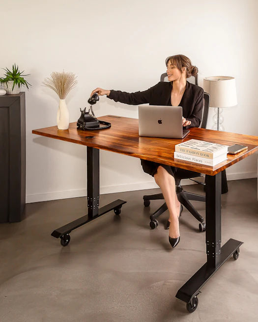 Professional female attorney standing in an office with legal books, phone number displayed.