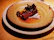 Close-up of a beautifully plated seafood dish with vibrant colors.