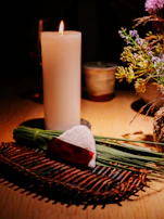A peaceful altar space featuring belongco candles, scripture cards, and fresh greenery.
