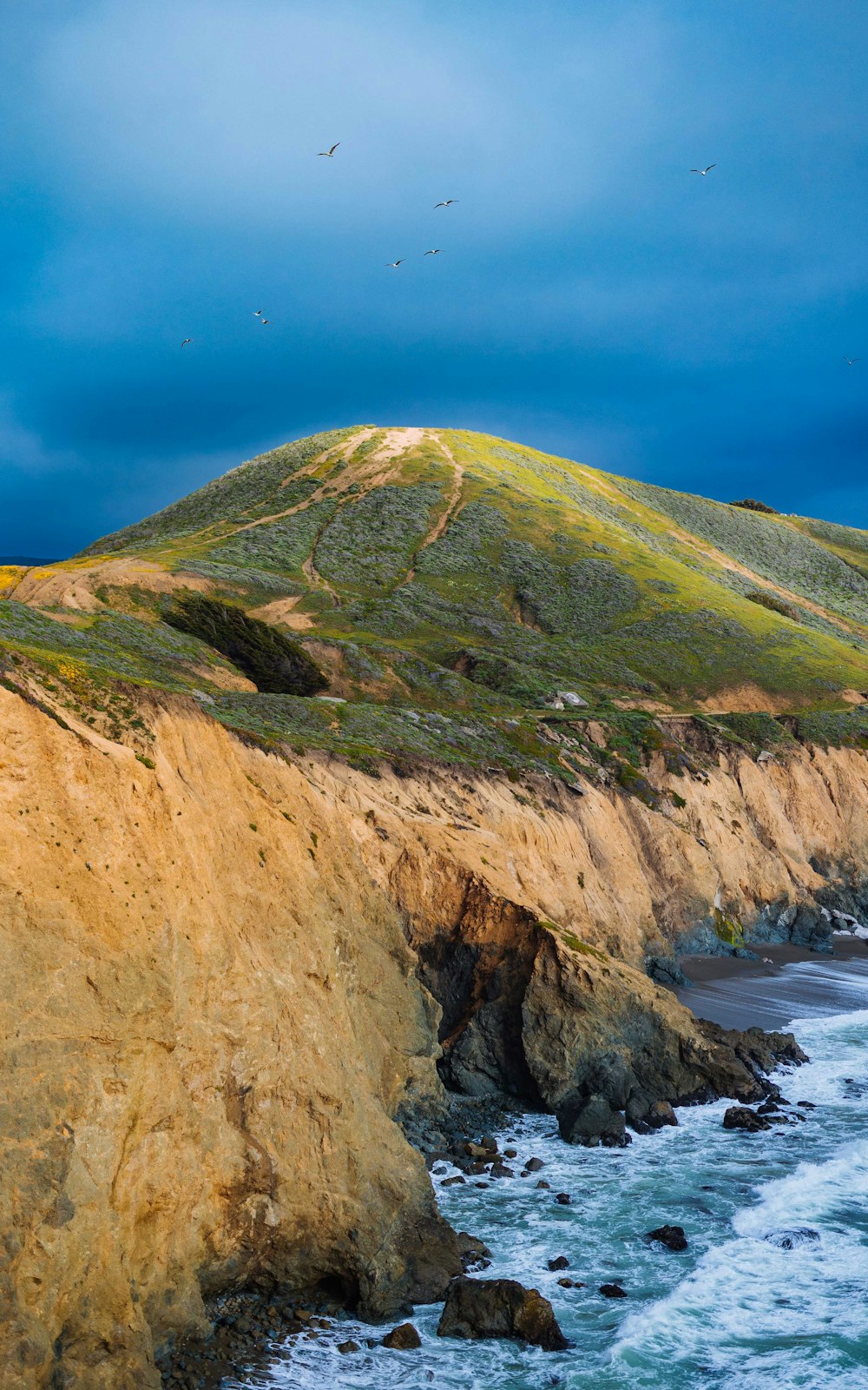 a view of the ocean from a cliff