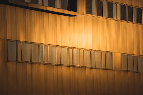 Exterior of a freshly painted building glowing under the evening sun