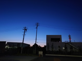 A calm urban landscape at dusk, highlighting clean lines and soft colors.