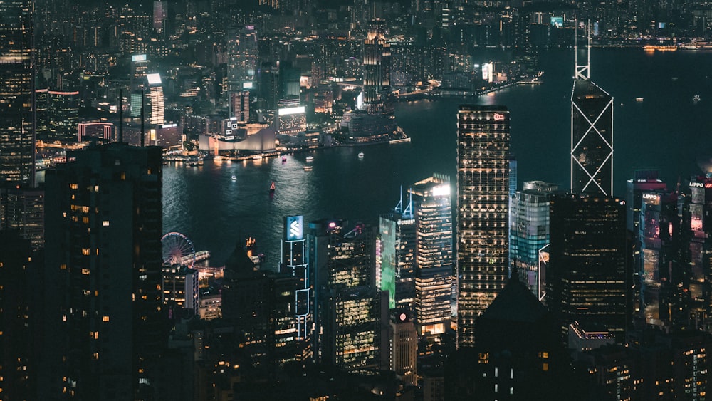 a view of a city at night from the top of a building