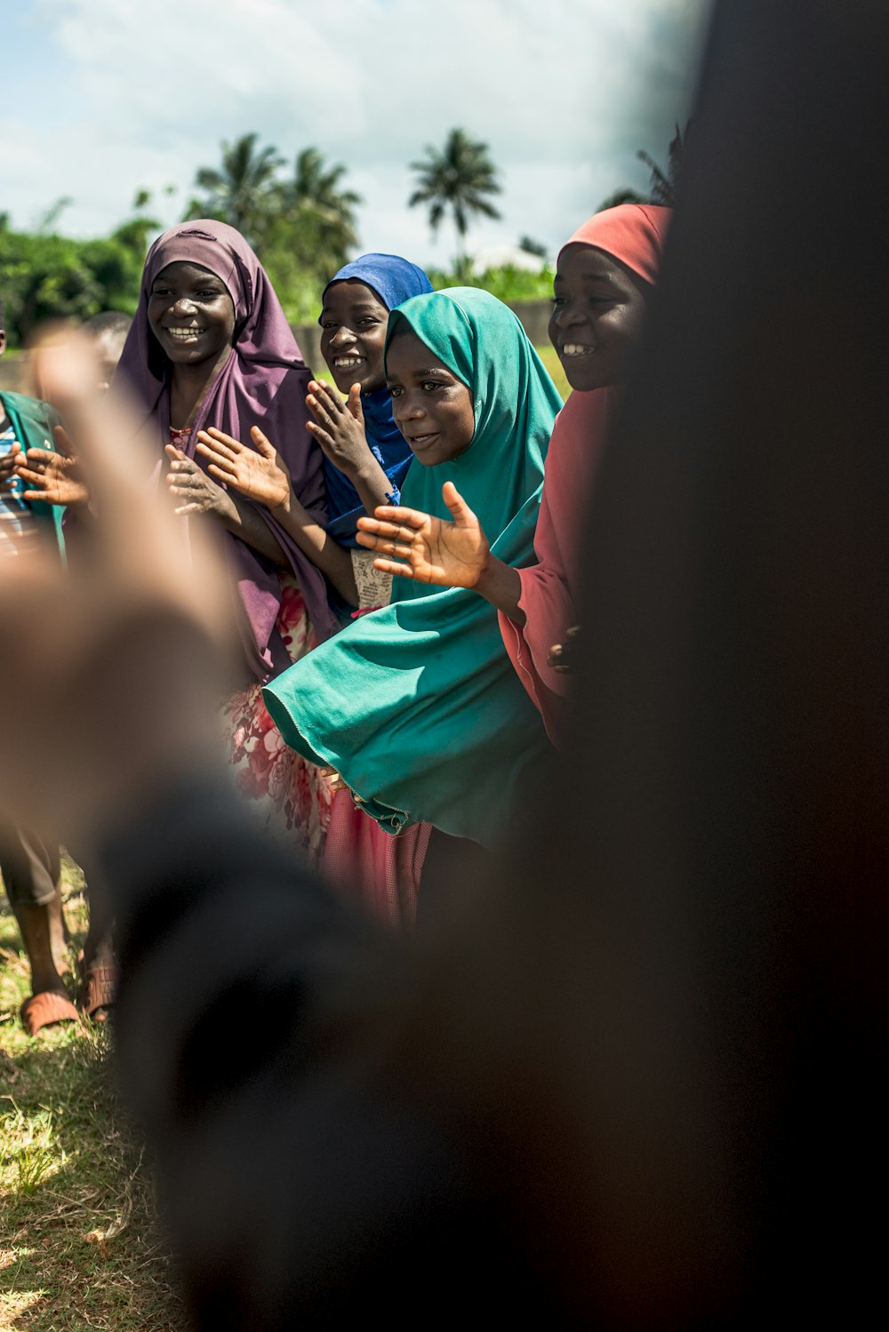 a group of women standing next to each other