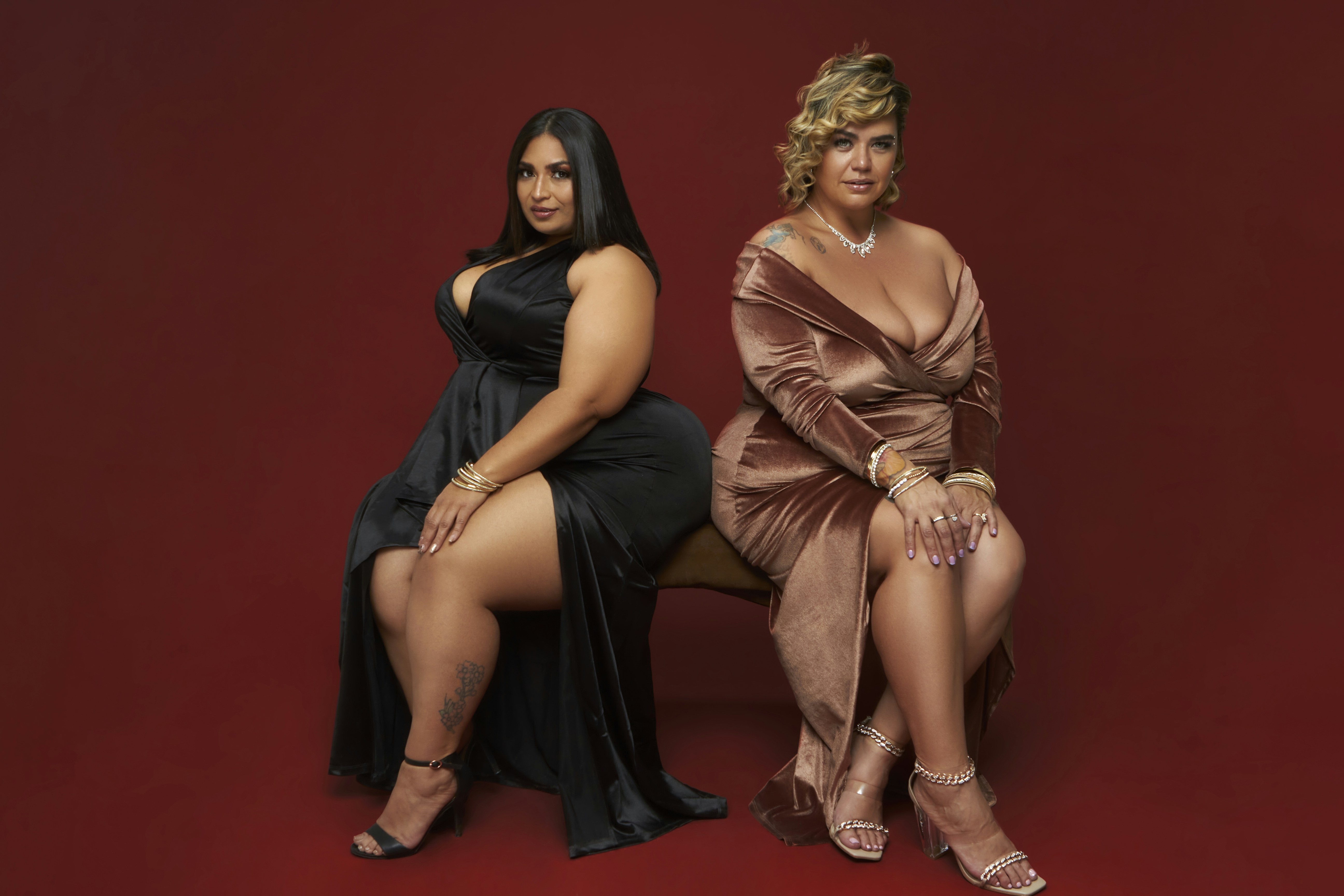 a couple of women sitting next to each other