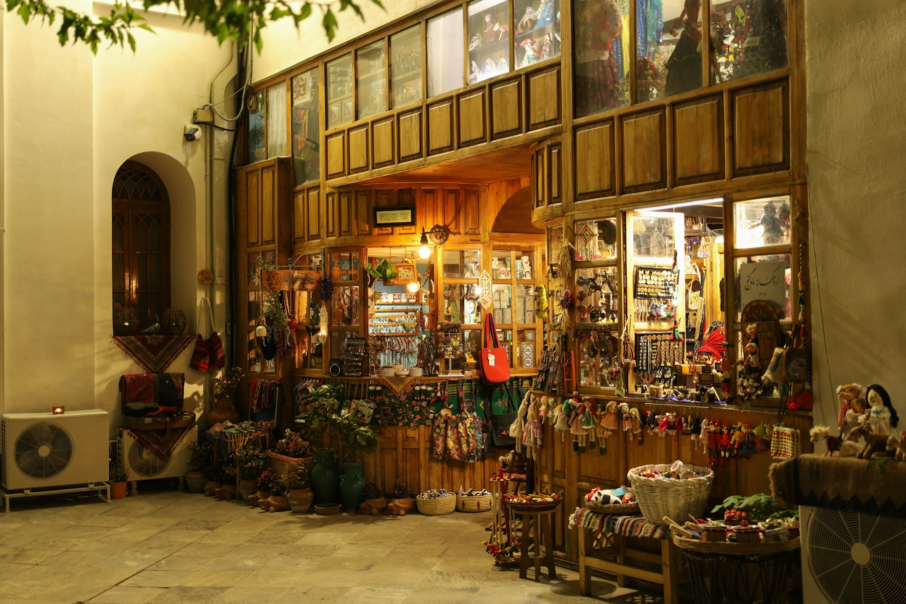 Indian handicraft shopfront with textiles and décor on display