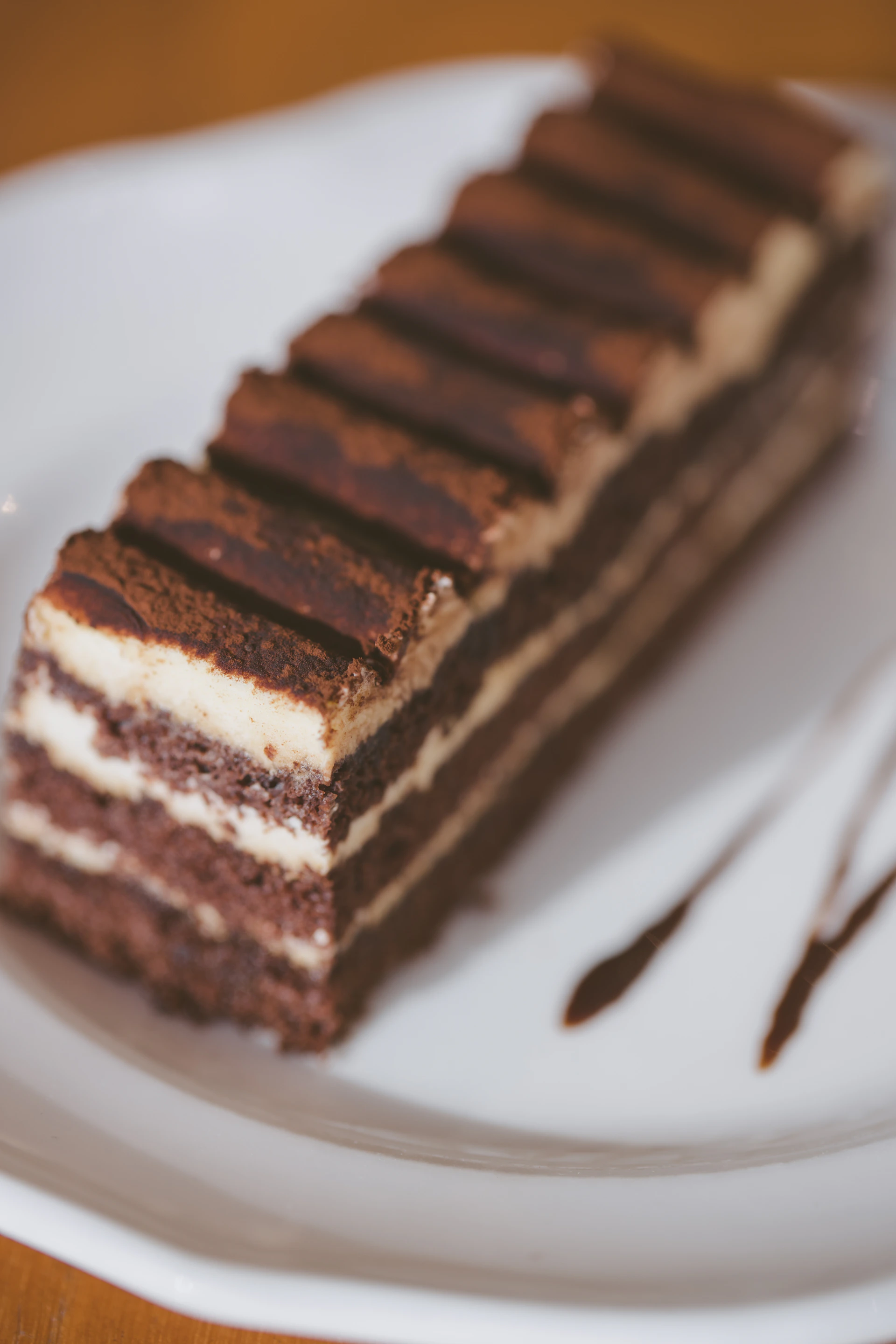 a piece of cake sitting on top of a white plate