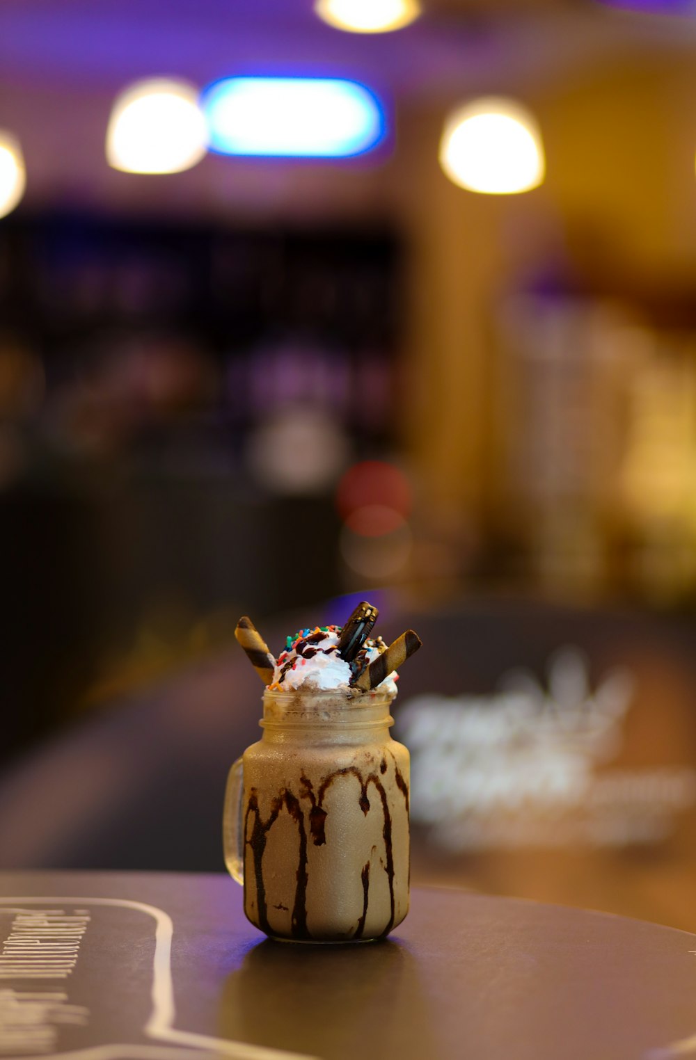 a dessert in a jar on a table