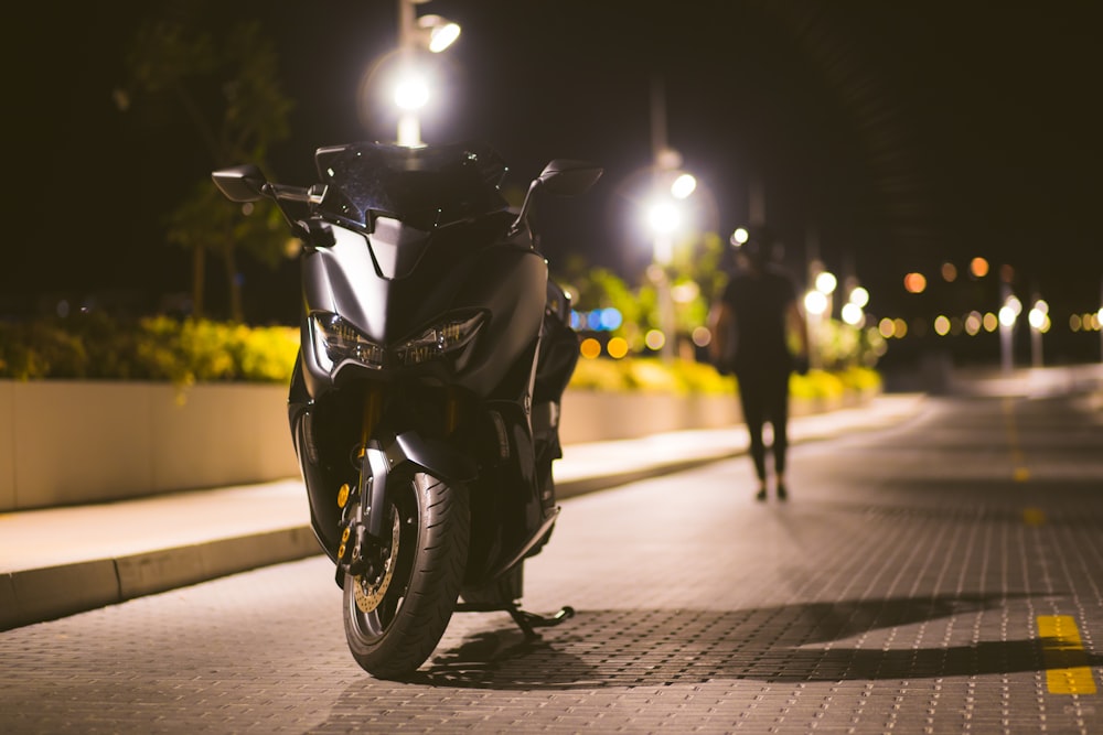 a motorcycle parked on the side of the road