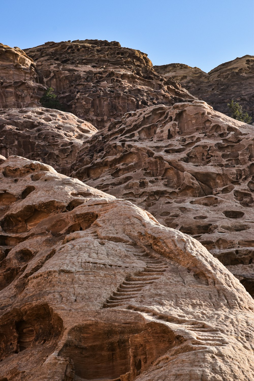 a rock formation with steps carved into it