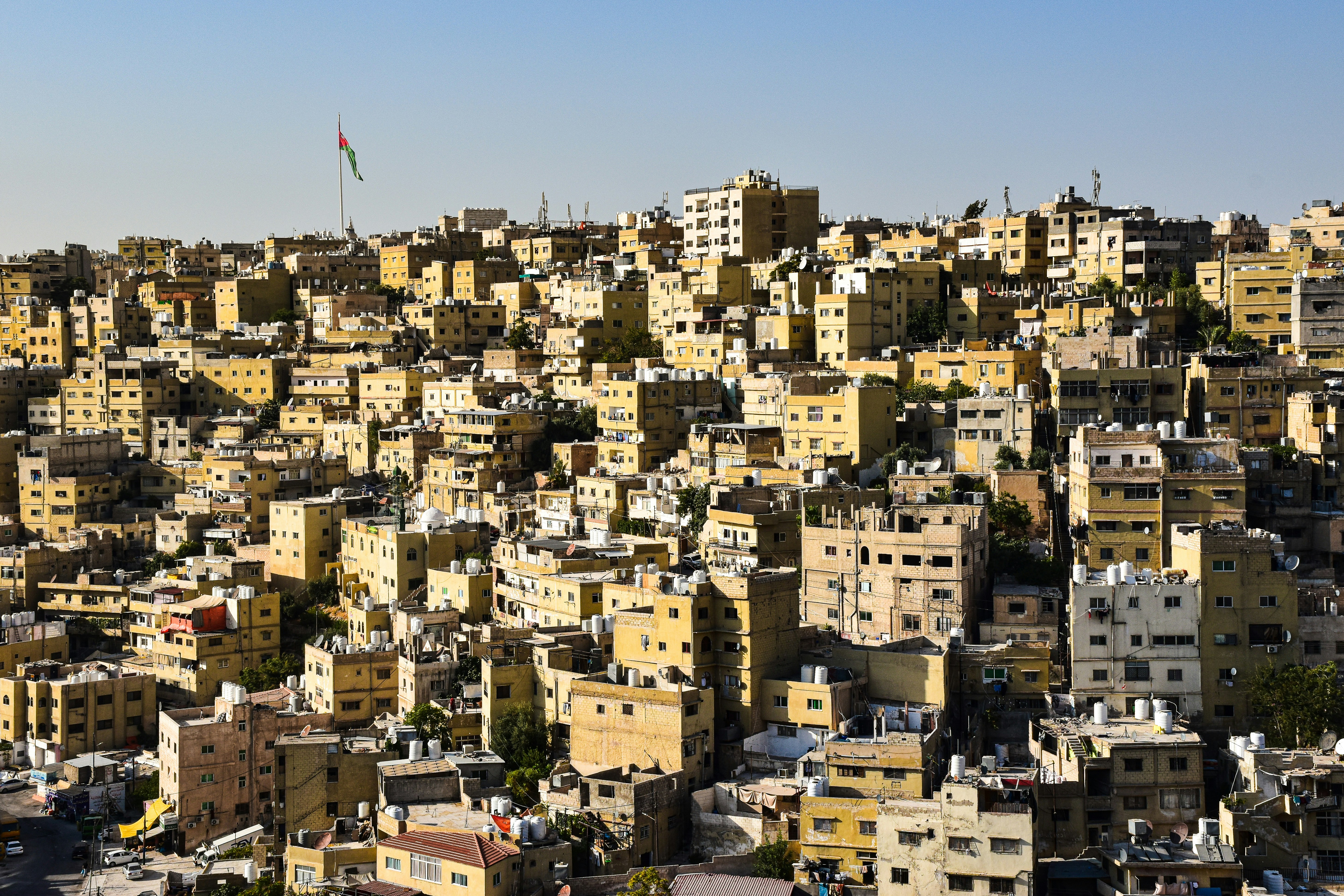 a large city with lots of yellow buildings, Amman, Jordan.