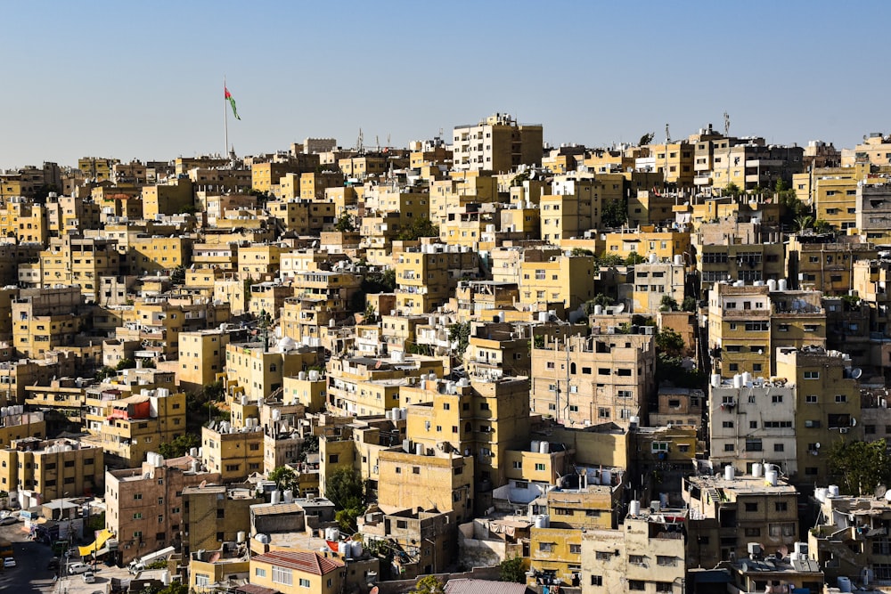 a large city with lots of yellow buildings