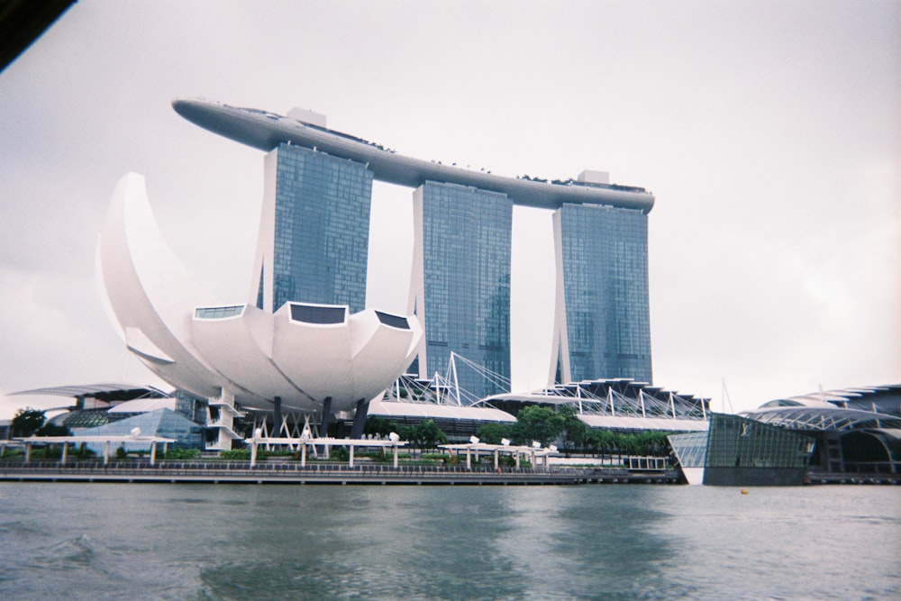 a large body of water next to tall buildings