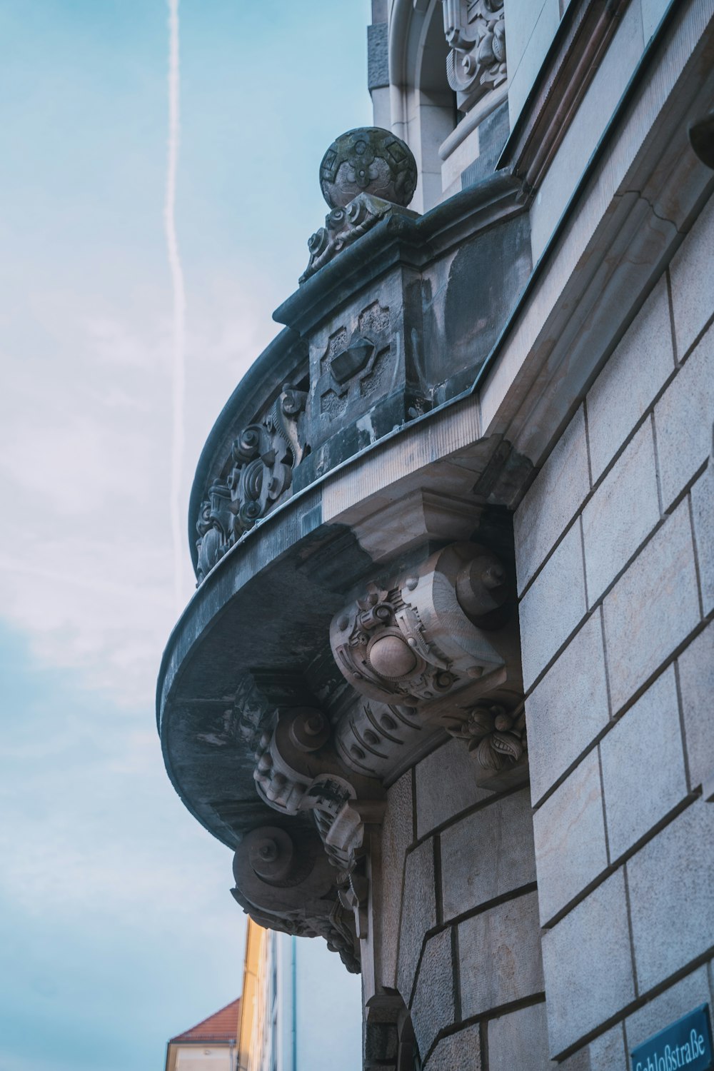 a tall building with a clock on the side of it