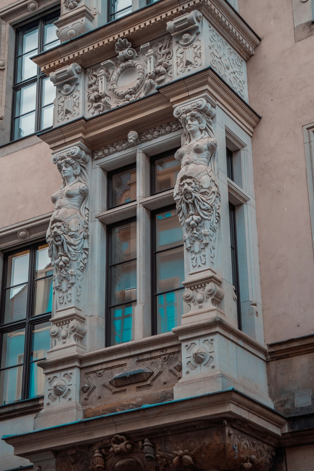 a tall building with a clock on the side of it