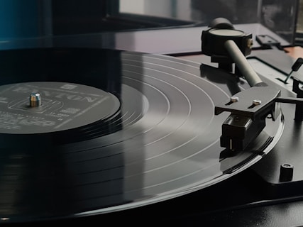 a turntable with a record player on top of it