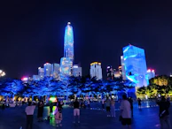A nighttime cityscape with glowing blue lights reflecting the energy of digital innovation.