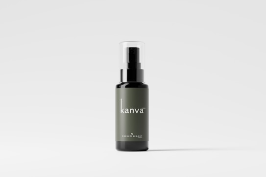 A sleek bottle with a minimalist design, featuring a dark green label and the brand name 'kanva' in white text. The bottle has a black pump dispenser and a transparent cap, set against a light gray background.