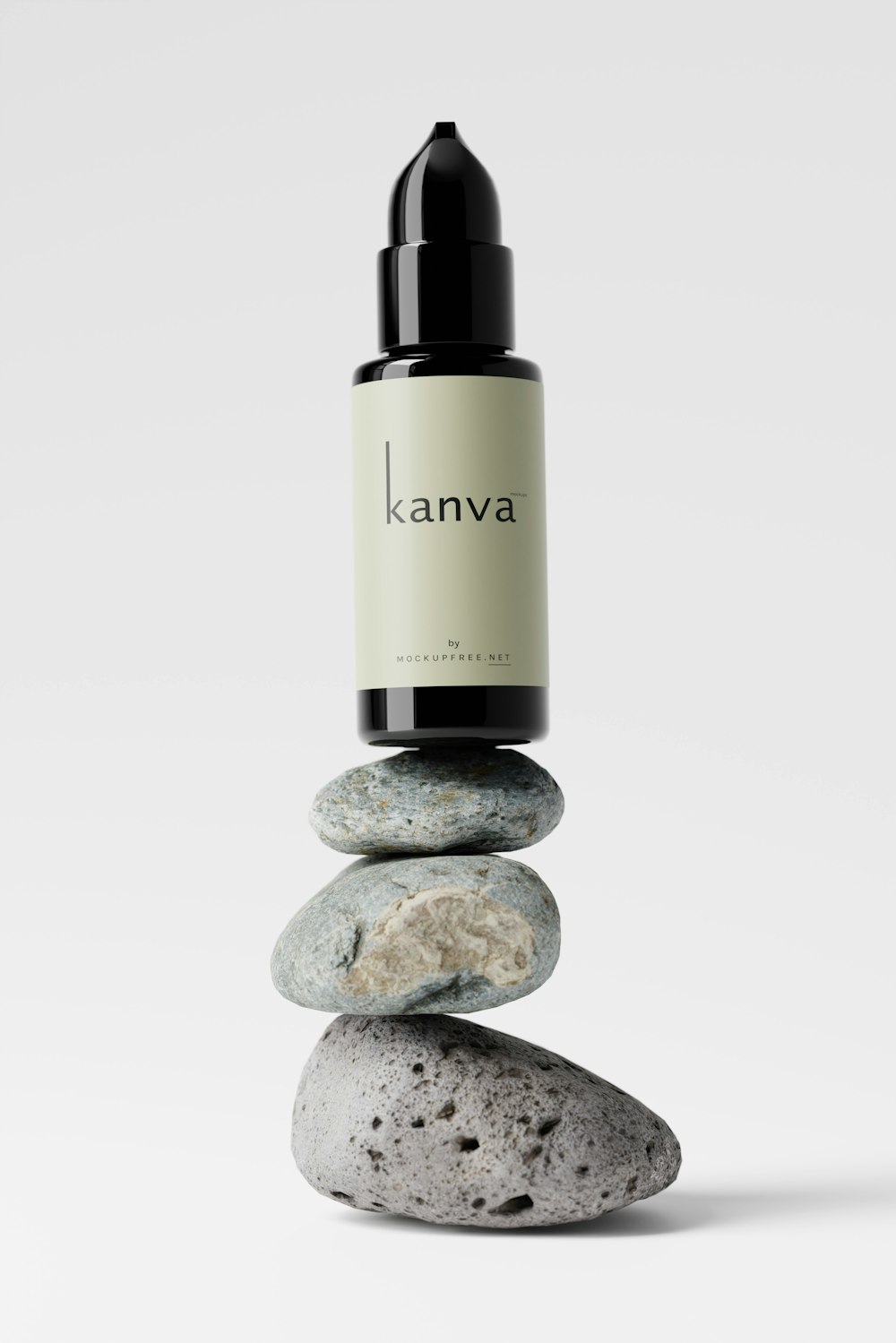 a bottle of kannava sitting on top of a pile of rocks