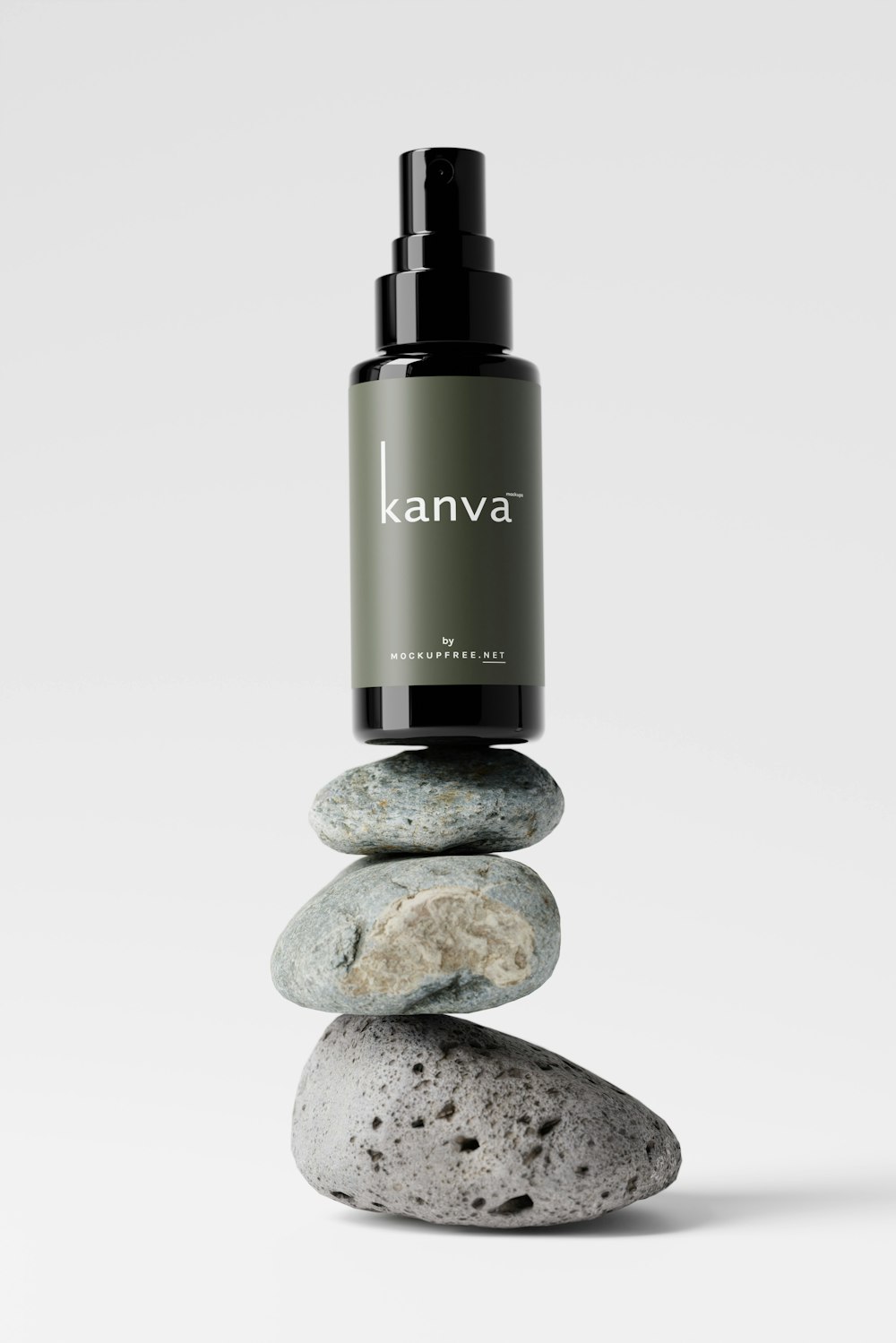 a bottle of kanva on top of a pile of rocks