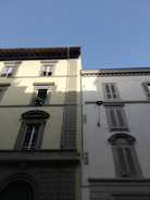 Before and after illustration of a renovated residential building in Lauingen.